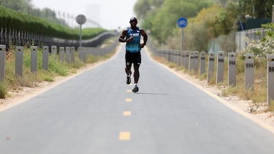 Ghani Souleymane is attempting to complete 100 full-distance T100 triathlons in 100 consecutive days, ending at the Dubai T100 on November 16. Chris Whiteoak / The National