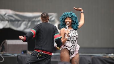 Nigerian singer and songwriter Wizkid and South African singer Moonchild Sanelly, right, perform together. Getty