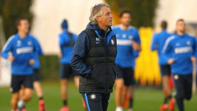 Roberto Mancini has hopes for Uefa Champions League qualification. Marco Luzzani / Getty Images