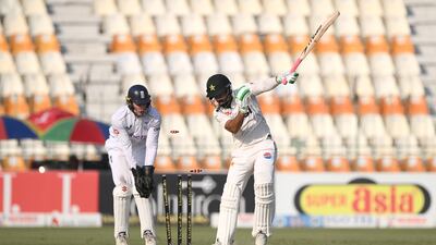 England wicketkeeper Jamie Smith looks on as Pakistan batsman Aamer Jamal is bowled by Jack Leach for one. Getty Images