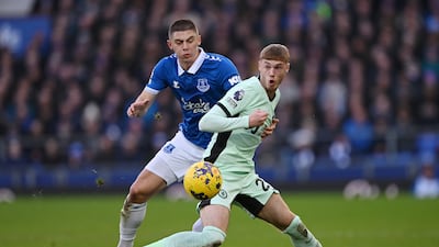 Vitaliy Mykolenko of Everton challenges Cole Palmer of Chelsea. Getty Images
