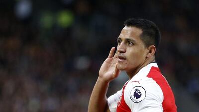 Arsenal’s Alexis Sanchez celebrates scoring their third goal. Russell Cheyne / Reuters