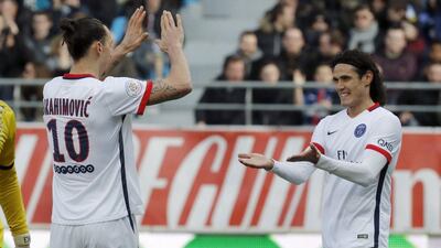Paris Saint-Germain’s Edinson Cavani and Zlatan Ibrahimovic celebrate after the first goal against Troyes. REUTERS/Philippe Wojazer