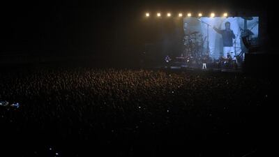 Spectators attend a rock music concert by Spanish group Love of Lesbian at the Palau Sant Jordi in Barcelona on March 27, 2021. AFP