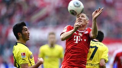 Bastian Schweinsteiger has admitted he is "flattered by Manchester United's interest.Andreas Gebert / EPA