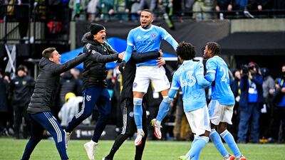 Defender Alexander Callens celebrates with teammates. USA TODAY
