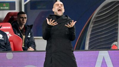 Manchester City manager Pep Guardiola looks frustrated on the sidelines. EPA