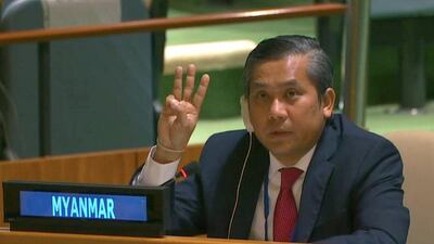 Myanmar's ambassador to the United Nations Kyaw Moe Tun holds up three fingers at the end of his speech to the UN.