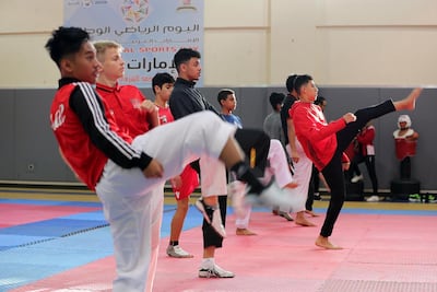Students of Taekwondo train at Asem bin Thabit Secondary School for Boys in Fujairah. Pawan Singh / The National