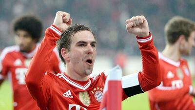 Philip Lahm celebrates after Bayern's victory on Sunday. Bernd Weissbrod / EPA