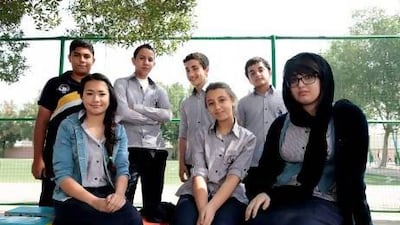 Left to right front row, Nadia Alaa, Rita Alkhatib and Wafa Al Qealy. Back, Mahmoud Elshamaa, Mahdi Ouri, Mohammed Zouheir and Fadi Osamaall took part in the competition. Jeffrey E Biteng / The National