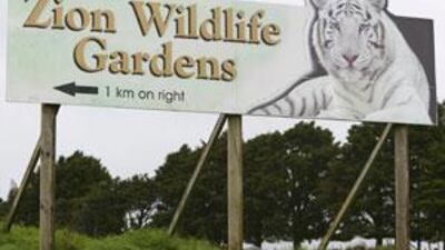 A sign at the entrance to the Zion Wildlife Gardens at Whangarei on New Zealand's North Island, is shown.