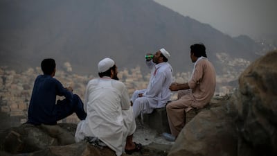 Muslim worshippers take a rest as they visit Mount Al-Noor. Mast Irham / EPA