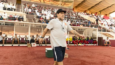 Diego Maradona walks towards the dugout in what was his maiden UAE First Division match in charge of Fujairah. They drew 1-1 with Al Orouba. Christopher Pike / The National