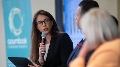 Tatiana Antonelli, founder and managing director of Goumbook, moderating in a panel discussion.