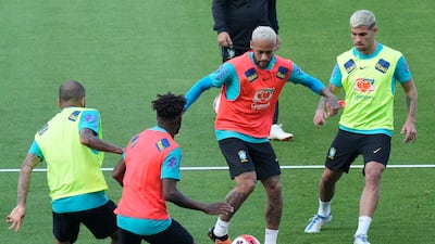 Brazil's Neymar, second from right, controls the ball during a training session at Goyang Stadium in South Korea. AP