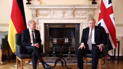 German Chancellor Olaf Scholz with UK Prime Minister Boris Johnson, during his first visit to London since succeeding Angela Merkel as Germany's leader. AFP
