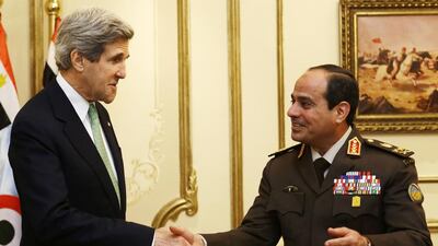 US secretary of state John Kerry, left, met the Egyptian defence minister Abdel Fattah El Sisi in Cairo last March. Jacquelyn Martin / AP Photo