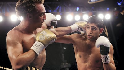 Paulie Malignaggi, May 15, 2010, rsc 11th On his US debut, after signing with Golden Boy Promotions, Khan was simply too fast for Malignaggi, a former and future world champion, as he won every round before stopping the New Yorker in the 11th round at Madison Square Garden’s theatre. Getty Images