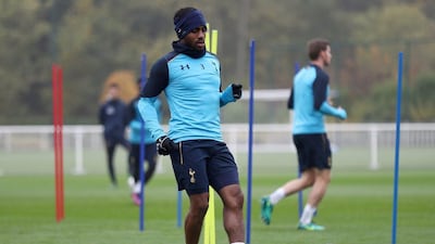 Tottenham’s Danny Rose passes the ball during training. Clive Rose / Getty Images