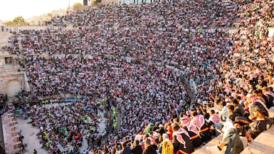 Jordanian football fans gather to watch on giant screens their national team's 2026 World Cup. AFP