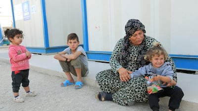 Syrian displaced people who fled violence after the Turkish offensive against Syria, arrived at the Domiz refugee camp on the outskirts of Dohuk, Iraq October 15, 2019. Reuters