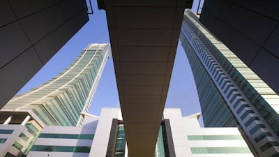 Above, Gulf Finance House's offices in the east building, right tower, of the Bahrain Financial Harbour. Jaime Puebla / The National