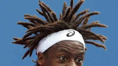 France’s Gael Monfils serves on January 19, 2016, during his first-round match against Japan’s Yuichi Sugita at the Australian Open tennis tournament at Melbourne Park, Australia. Brandon Malone / Reuters