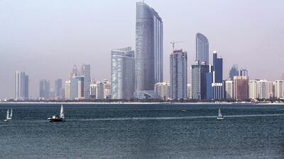 The Landmark skyscraper, center, stands on the city skyline beside a waterway in Abu Dhabi. Alex Atack / Bloomberg