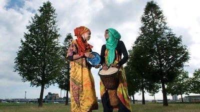 Sakinah, left, and Rabiah Abdullah make up the hijab-wearing rappers Pearls of Islam.