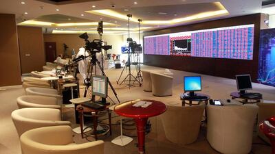 Stock information are seen at Qatar Stock Exchange in Doha. Reuters