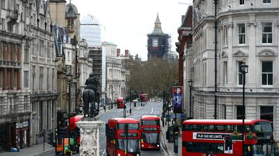 London buses travel along Whitehall in Westminster in London. Reuters