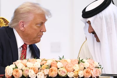 US President Donald Trump and Emir of Qatar Sheikh Tamim attend a signing ceremony at the Amiri Diwan, the official workplace of the emir, on May 14 last year, in Doha, Qatar. Getty Images