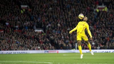 Liverpool's Raheem Sterling controls the ball during his side's Premier League loss to Manchester United on Sunday. Oli Scarff / AFP / December 14, 2014