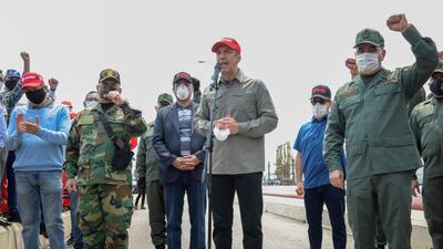 The Venezuelan industry minister Tareck El Aissami (C), speaks next to Venezuela's defence Minister Vladimir Padrino(R) after the Iranian oil tanker Fortune docked at the El Palito refinery in Puerto Cabello, in the northern state of Carabobo, Venezuela. AFP
