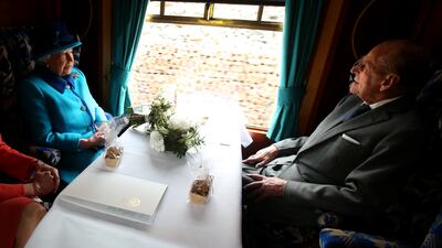 Queen Elizabeth and Prince Philip inaugurate the new Scottish Borders Railway in 2015, on the day she became Britain's longest-reigning monarch. Getty