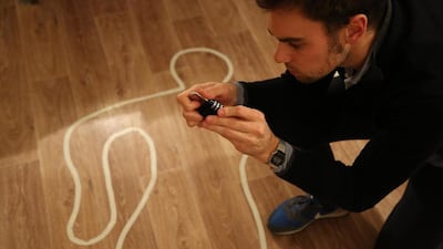 A chalk outline at a crime scene HintHunt Dubai. Courtesy HintHunt