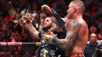 NEWARK, NEW JERSEY - JUNE 01: (L-R) Islam Makhachev of Russia celebrates defeating Dustin Poirier in their lightweight title bout during UFC 302 at Prudential Center on June 01, 2024 in Newark, New Jersey. Luke Hales / Getty Images / AFP (Photo by Luke Hales / GETTY IMAGES NORTH AMERICA / Getty Images via AFP)