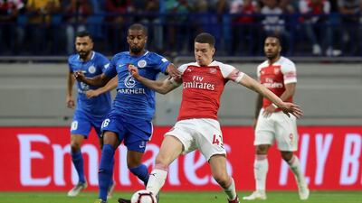 Amer Mubarak of Al Nasr and Charlie Gilmour of Arsenal in action. Pawan Singh / The National