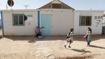 Children play at the Refugee Camp of Zaatari, near the Syrian Border, 100km North West of Amman, Jordan. EPA