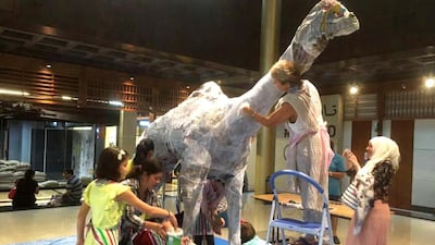 Artists will transform the Food Court square at the World Trade Centre Mall in Abu Dhabi into an art workshop to create life-size animal sculptures using bottles. Courtesy World Trade Center Abu Dhabi