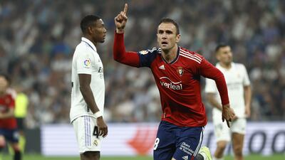 Osasuna's Kike Garcia celebrates after scoring the equalising goal against Real Madrid. EPA