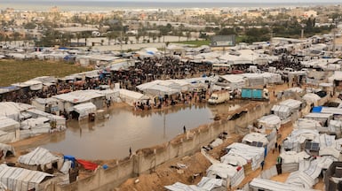 Displaced Palestinians shelter at a flooded makeshift camp in Khan Younis, southern Gaza. Reuters