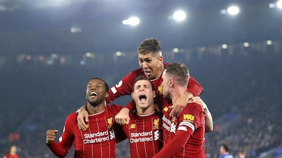 James Milner celebrates after scoring with Roberto Firminho, Jordan Henderson and Georginio Wijnaldum. Getty Images