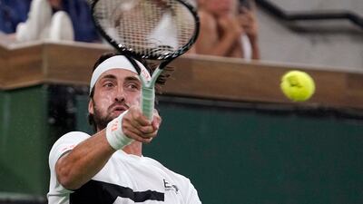 Nikoloz Basilashvili, of Georgia, returns against Cameron Norrie, of Britain. AP Photo