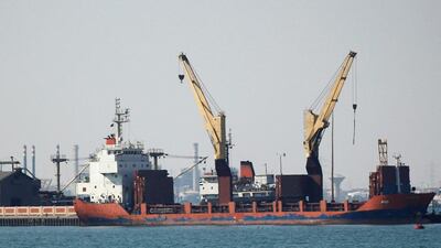 Container ships prepare to enter the Suez Canal north of Cairo. Egypt uses the canal as a major source of hard currency. Amr Abdallah Dalsh / Reuters