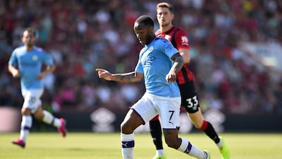 Manchester City's Raheem Sterling runs with the ball against Bournemouth. AFP