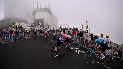 Tke peloton reaches the summit of Mont Ventoux.