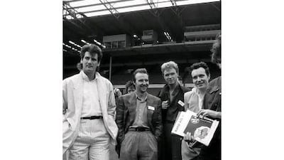 The Band Aid team at Wembley Stadium, London, in 1985. From left, Tony Hadley, Midge Ure, Gary Kemp, Adam Ant, Bob Geldof and Elton John.