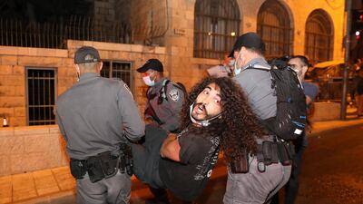 Israeli police detain demonstrators during a protest against Israeli Prime Minister Benjamin Netanyahu outside his residence in Jerusalem, Israel. EPA